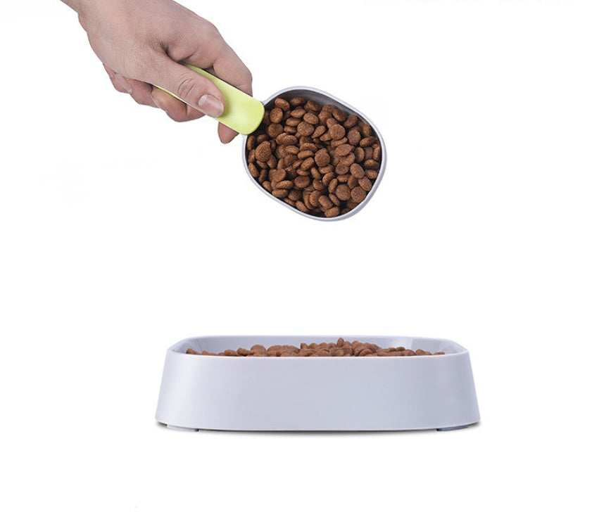 “Adjustable Pet Food Scoop – Measure & Serve Dog & Cat Food Easily”