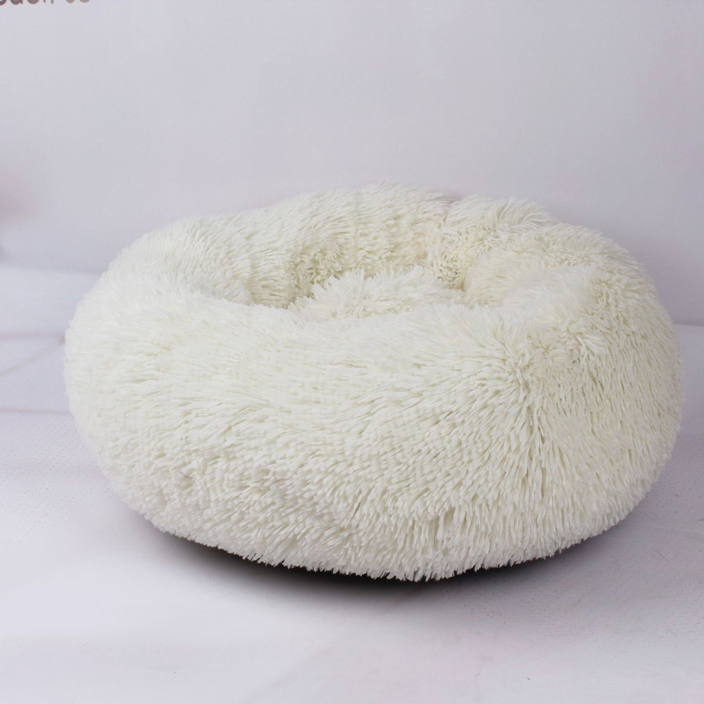 Plush Pet Nest Bed – Cozy Calming Donut Bed for Cats & Small Dogs